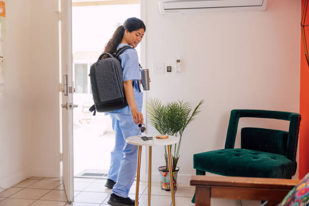 istock Woman nurse leaving from home 2150580625