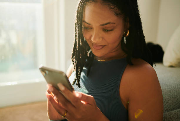 istock Joyful Relaxation: A Woman Texting On A Mobile Phone 2150583366
