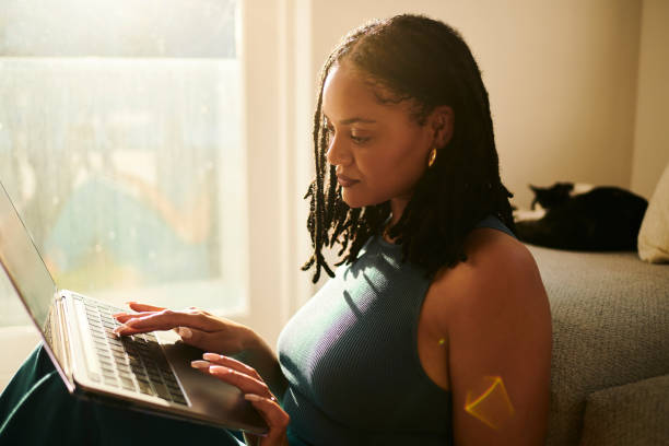 istock Relaxed Productivity: Woman Typing on Laptop 2150583392