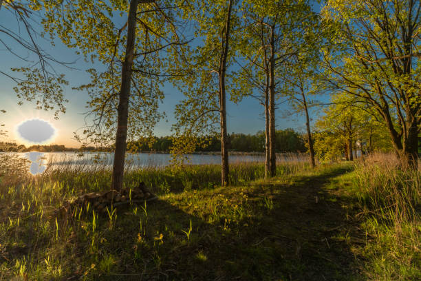 istock Dam between Bezdrev and Cesnovicky cip pond with spring color sunset with trees 2150584434