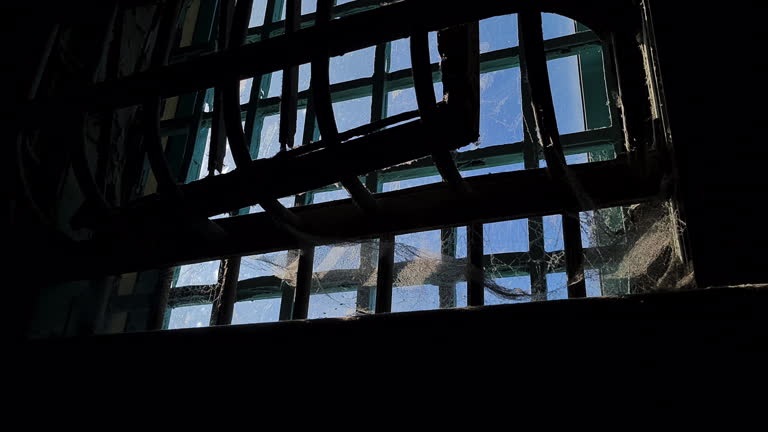 Alcatraz Federal Prison USA, Cobweb on Metal Bars and Window, Inside View