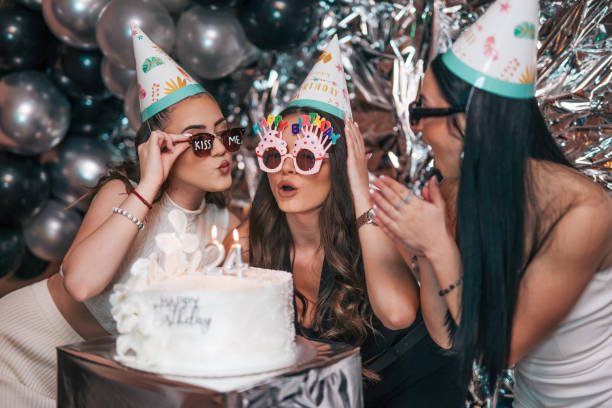istock Three young friends at birthday party. 2150591563