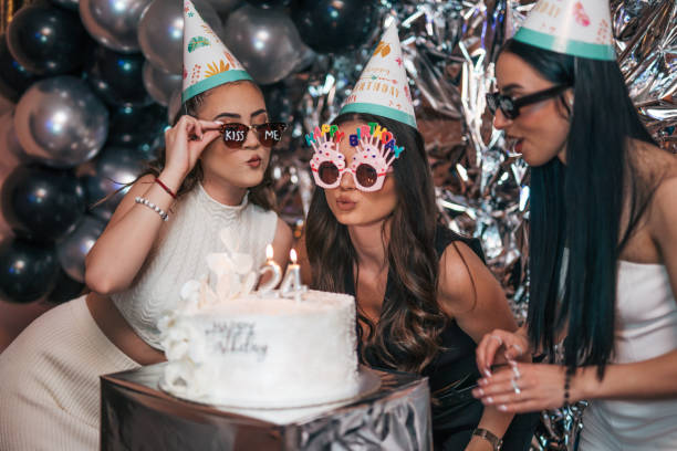 istock Three young friends at birthday party. 2150591601