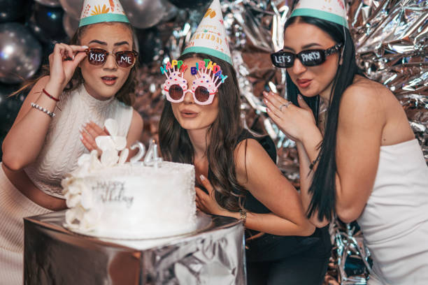 istock Three young friends at birthday party. 2150591649