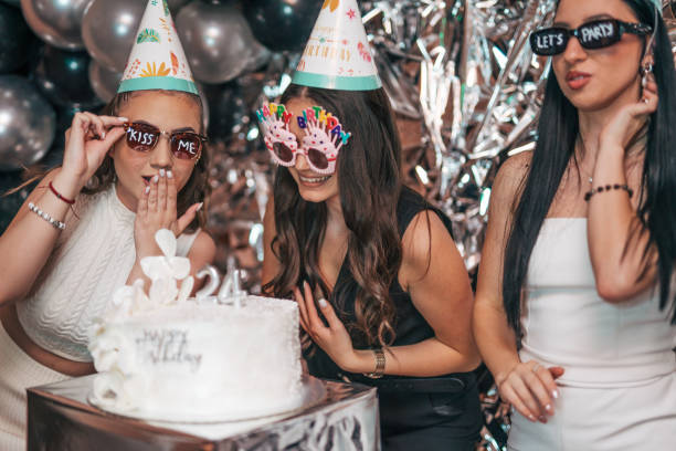istock Three young friends at birthday party. 2150591731