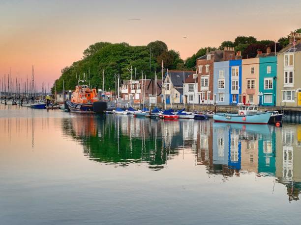 Colourful buildings at sunset Weymouth harbour
