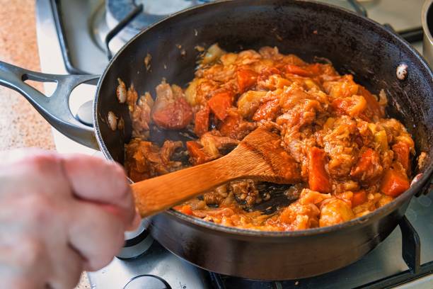 istock Cooking zucchini stew in a frying pan. 2150592681