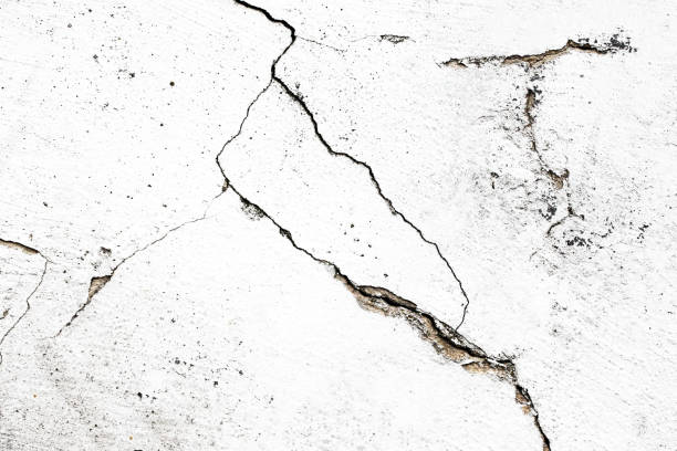 istock Black crack background. Scratched lines texture. White and black distressed grunge concrete wall pattern for graphic design. 2150594039