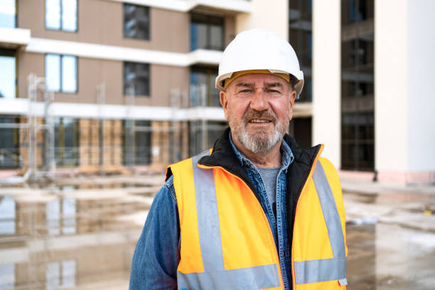 istock Portrait of happy construction worker at construction site 2150598855