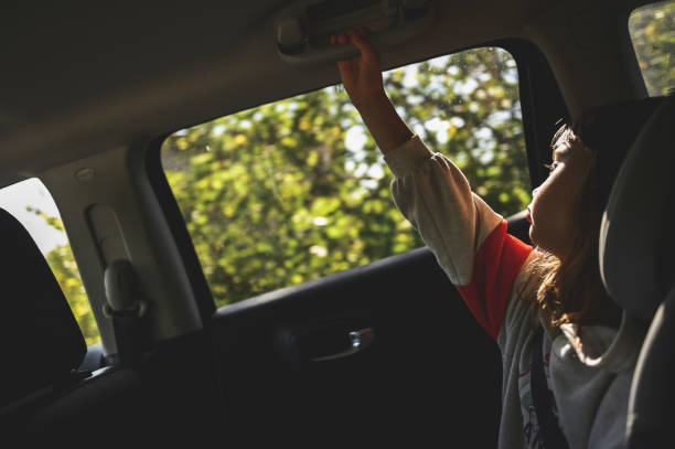 istock Child in a car inn road trip. 2150600336