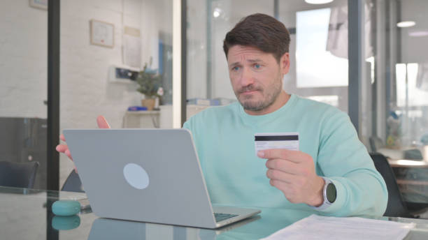 istock Creative Man Upset with Credit Card Failure, Payment 2150605515