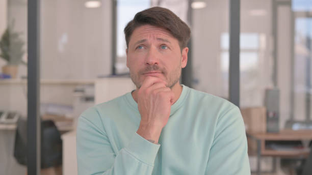 istock Portrait of Man Brainstorming New Idea 2150606611
