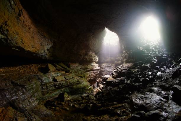 istock Light Beams illuminating the Stephens Gap  Cave Alabama 2150609083