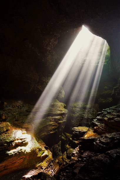 istock Light Beams illuminating the Stephens Gap  Cave Alabama 2150609095