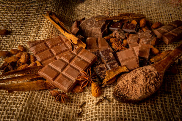 istock Chocolate and spices on a rustic jute background 2150610108