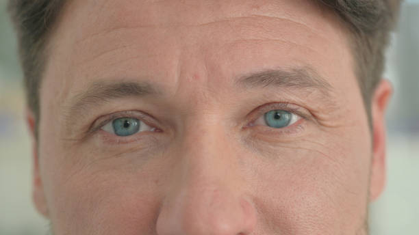 istock Close up of Male Blinking Eyes 2150610859