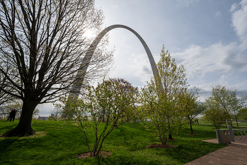 Saint Louis, Missouri - April 9. 2024 - Gateway Arch National Park under dramatic morning cloudscape in April.