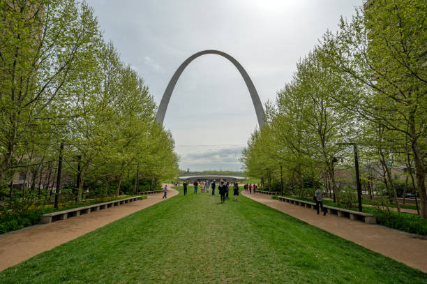 Saint Louis, Missouri - April 9. 2024 - Gateway Arch National Park under dramatic morning cloudscape in April.
