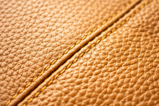 istock luxury brown leather bag texture background with stitching 2150611769