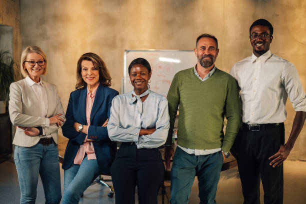 istock Professional interracial businesspeople at boardroom looking at camera 2150612272