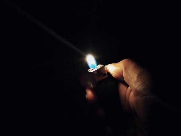 istock the light of a match in the dark 2150617306