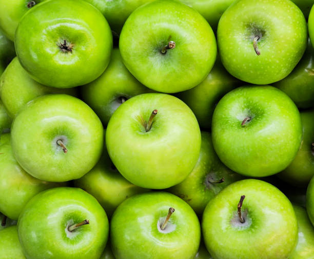 istock Green apples look fresh and neatly arranged 2150620301