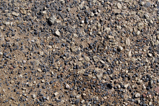 Small rocks and pebbles gravel abstract textured background