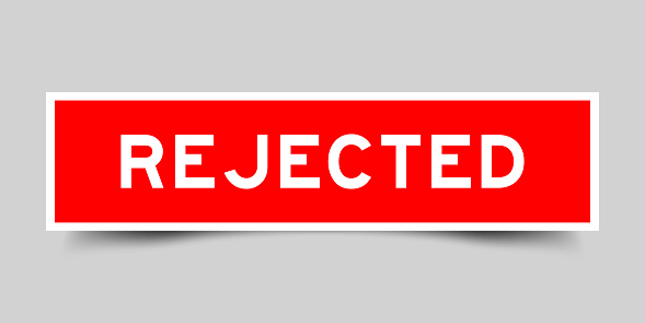 Square sticker label with word rejected in red color on gray background