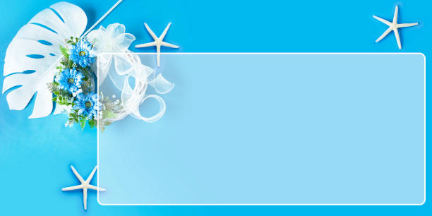 Blue gerbera wreath and white ribbon with blue background.