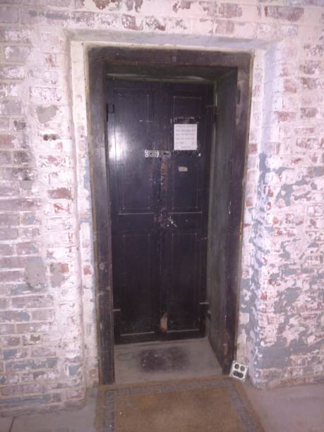 istock Old door in brick building 2150630879
