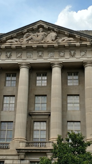 Entrance to an old building with tall columns