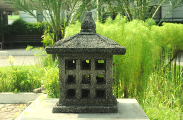 istock Javanese stone lantern in the garden. 2150634714