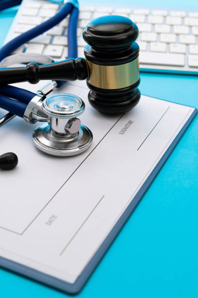 istock Gavel and stethoscope on blue background 2150634745