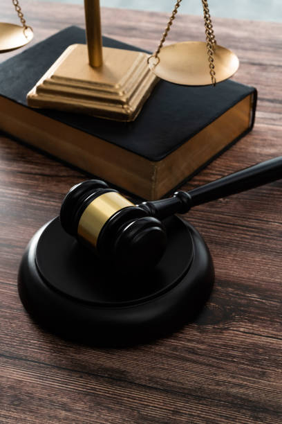Gavel and scales of justice on the table.