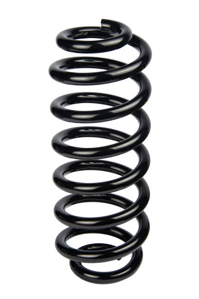 istock Car spare part. Large metal spring on white background. cushioning spring over white background, auto spare parts. automotive suspension springs 2150638157