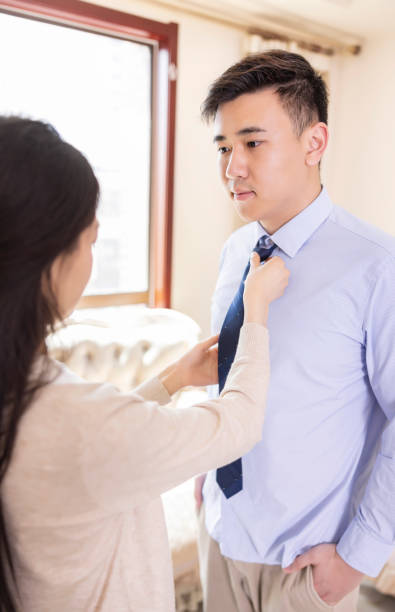 istock Women tie ties for men 2150639170