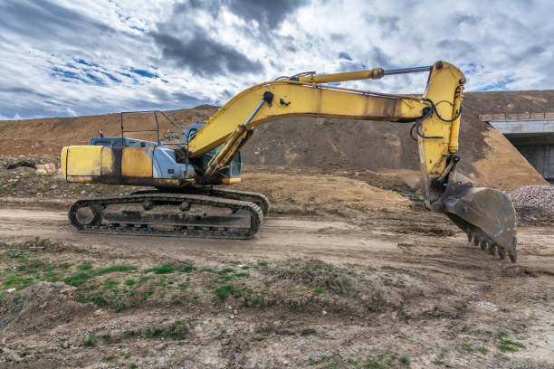 istock Excavator building a road in a site construction 2150642024