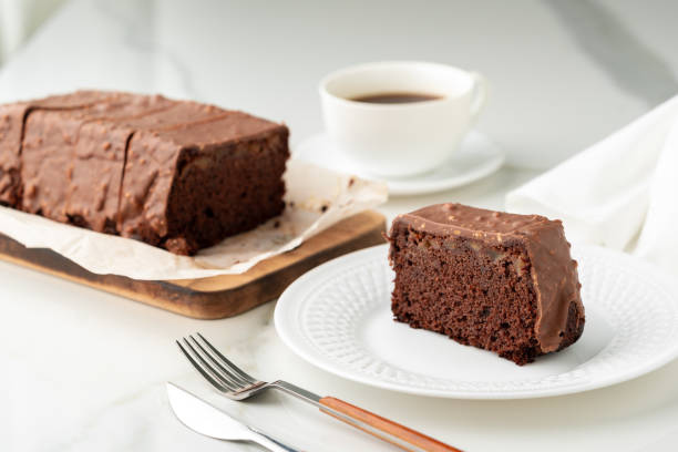 istock Fresh homemade chocolate sponge cake on wooden board 2150643241