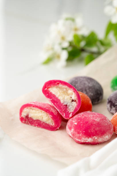 istock Multi-colored Japanese cakes Mochi in a white plate 2150643307
