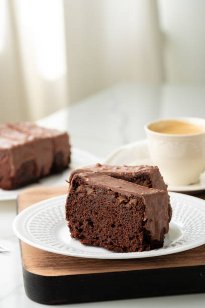 istock Fresh homemade chocolate sponge cake on wooden board 2150643525