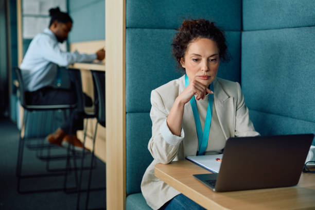 istock Female entrepreneur working on laptop in the office. 2150644638