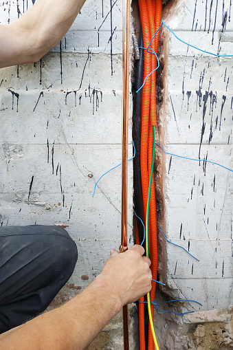 Connection of a copper tube for grounding of the electric shock-proof device in an apartment house. 2019