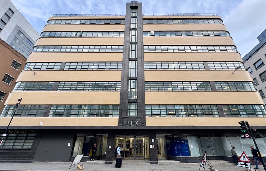 London, UK - February 19, 2024: Exterior view of Ibex House, an art deco office building in London, UK.