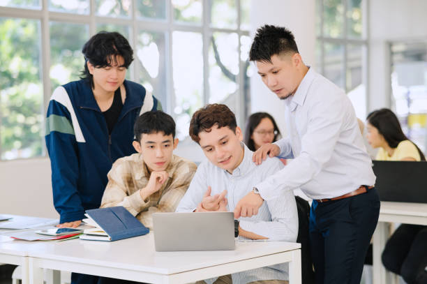 istock Small Asian business team meeting. 2150648295