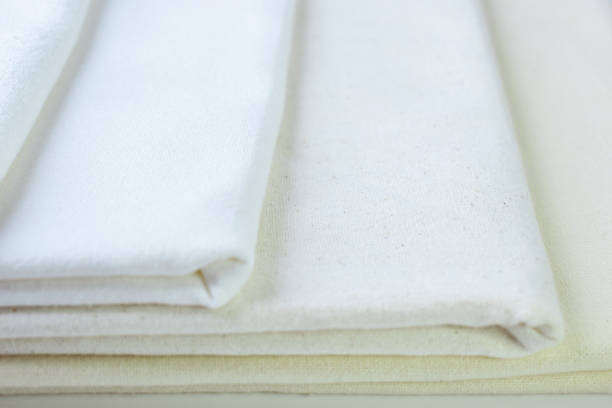 istock stack of white cotton clothes, textile fashion industry 2150649910