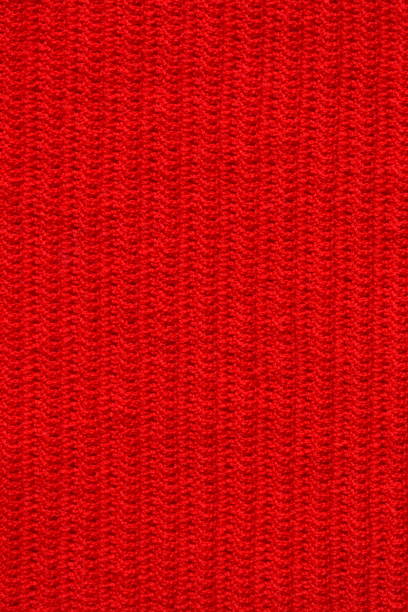 istock texture of red wool knitted yarn, woolen fabric background 2150649921
