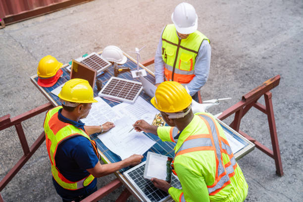 istock Portrait of team engineer working on solar panel and his blueprints with Solar. 2150650188
