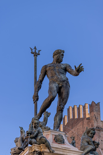Bologna Neptune Fountain features the god of the sea towering with his trident, while cherubs and dolphins frolic in the waters below