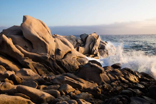 Sunrise on the rocky peninsula of Capo Testa, near Santa Teresa Gallura, is always different, yet surprising at the same time. The imposing granite boulders that counter the sea are illuminated by the first golden rays of the sun.