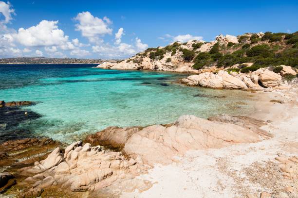 There are many wonderful beaches on the island of Caprera. One of the most beautiful is Cala Napoletana, which can only be reached by sea or by a long trek. Its incredible colors stand out against the granite rocks, Mediterranean scrub and white sand.